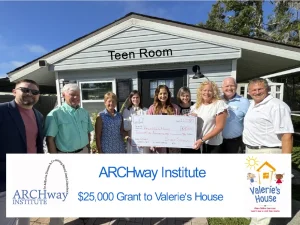 ARCHway Institute presents a giant $25,00 check to Valerie's House in Punta Gorda FL